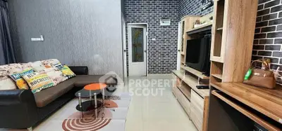 Stylish living room with modern decor and entertainment center