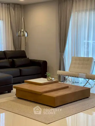 Modern living room with stylish furniture and elegant decor