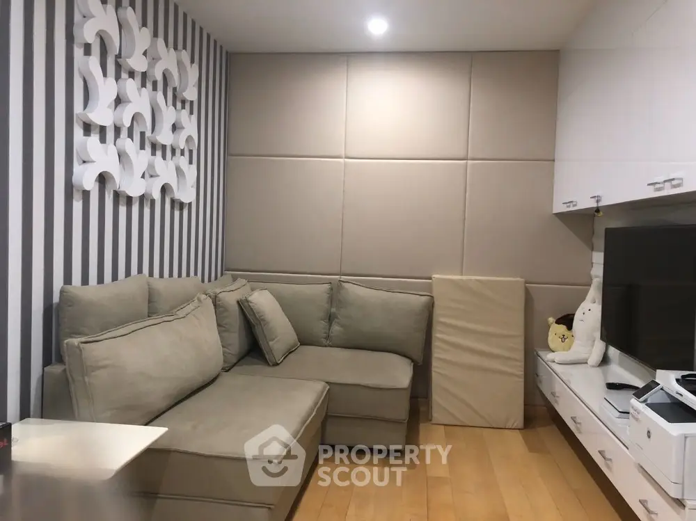 Modern cozy living room with stylish decor and comfortable sectional sofa