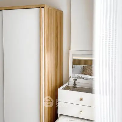 Stylish bedroom corner with modern wardrobe and elegant dresser