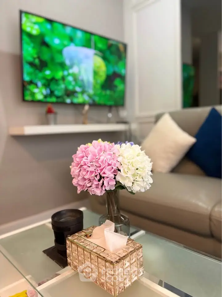 Stylish living room with modern decor and vibrant floral centerpiece