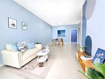 Spacious modern living room with stylish decor and open dining area
