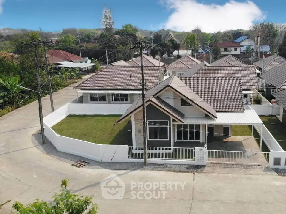 Charming suburban house with spacious yard and modern design in a peaceful neighborhood.