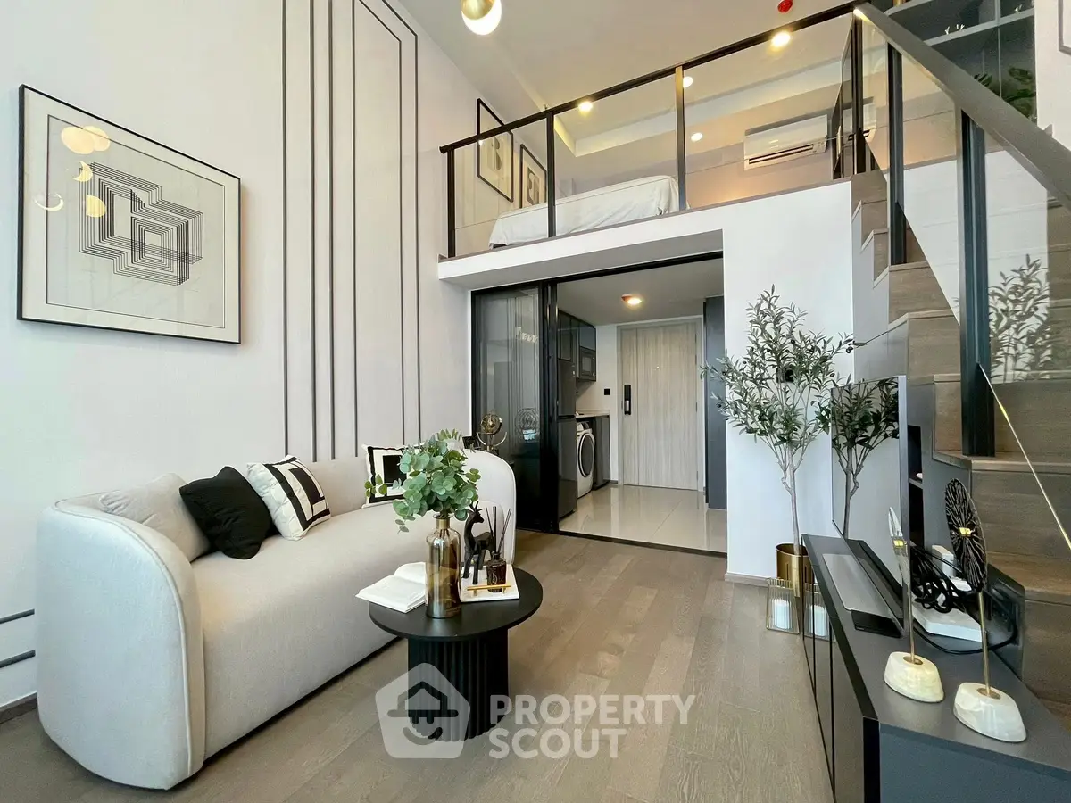 Modern loft apartment with stylish living room and mezzanine bedroom