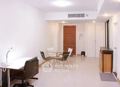 Modern living room with sleek furniture and bright lighting, perfect for a contemporary lifestyle.