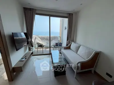 Modern living room with sea view and stylish furniture