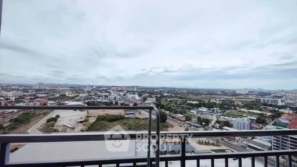 Stunning panoramic cityscape view from a high-rise balcony, perfect for urban living enthusiasts.