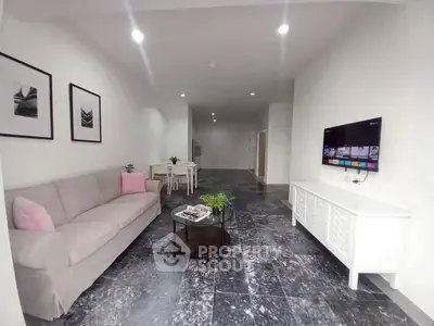 Spacious modern living room with sleek design and stylish decor