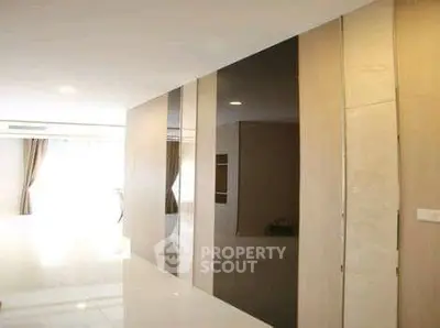 Modern minimalist interior with sleek design and ample natural light
