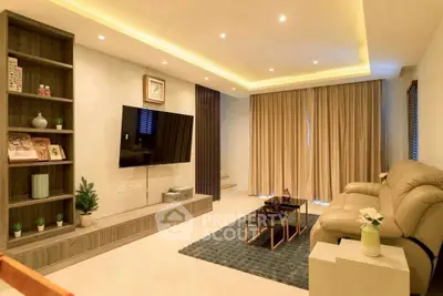 Luxurious living room with modern decor, plush seating, and ambient lighting for ultimate comfort.