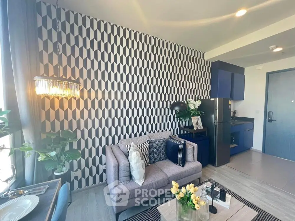 Stylish modern living room with geometric wallpaper and cozy seating area