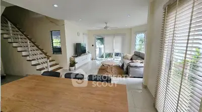 Spacious modern living room with natural light and stylish decor