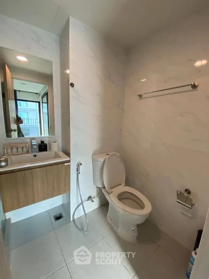 Modern bathroom with sleek fixtures and natural light