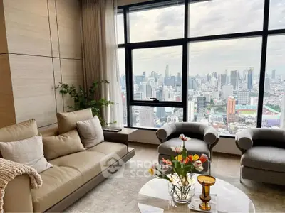 Luxurious living room with stunning city view, modern furniture, and elegant decor in high-rise apartment.