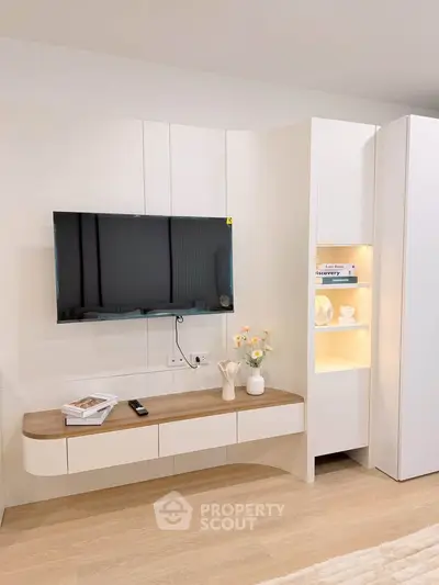 Modern living room with sleek TV unit and stylish decor