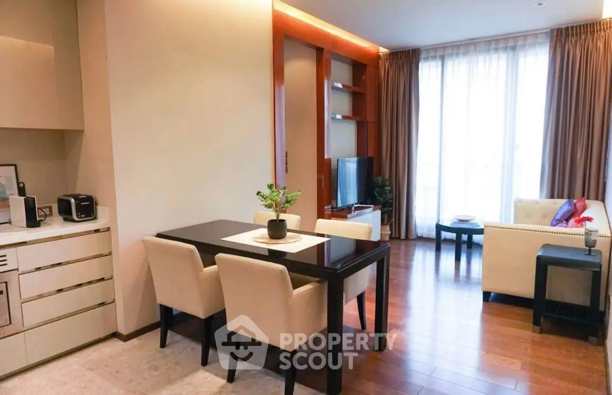 Modern living room with dining area and natural light