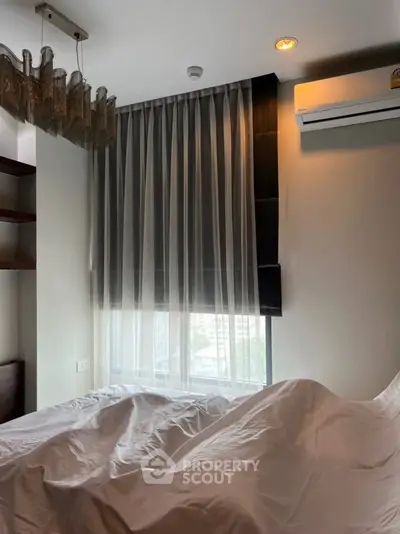 Cozy bedroom with modern decor and natural light