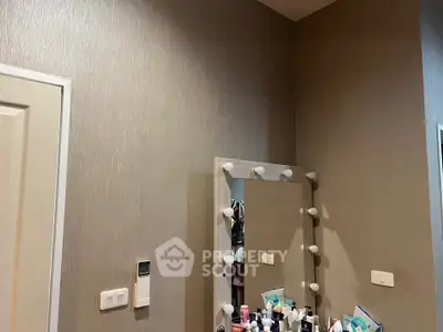 Stylish bedroom corner with vanity mirror and modern decor