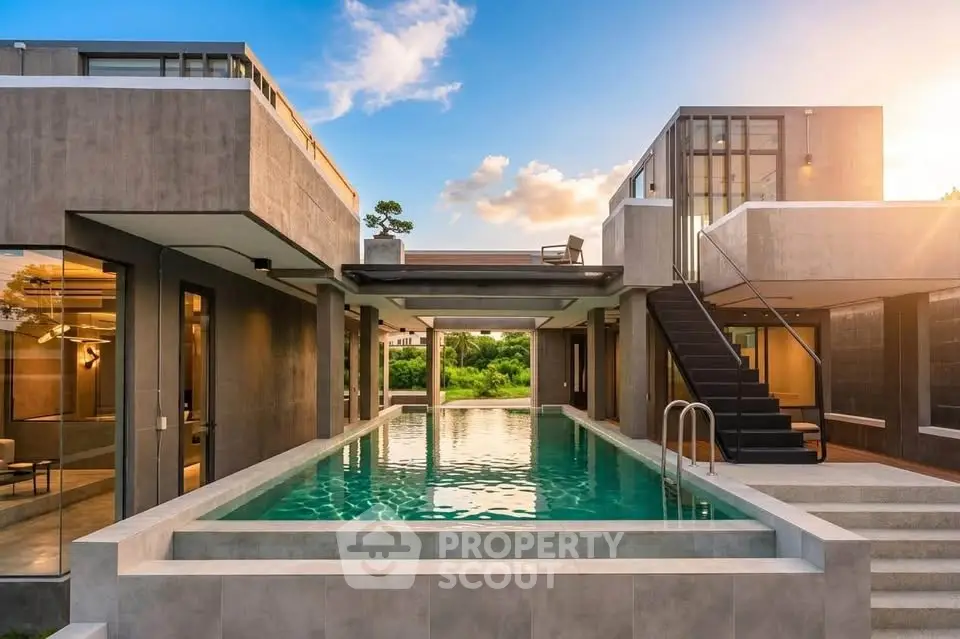 Luxurious modern villa with stunning infinity pool and sleek architectural design.