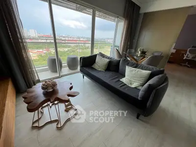 Modern living room with stunning city view and stylish furniture