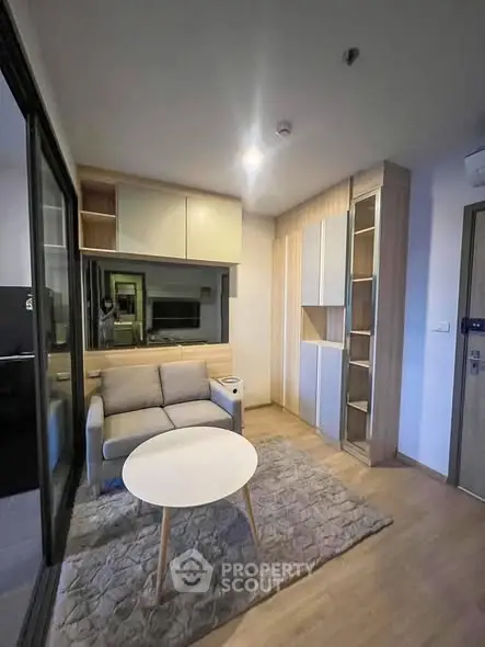 Modern living room with cozy sofa and stylish storage solutions