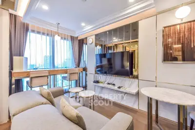 Luxurious modern living room with panoramic city view and elegant decor