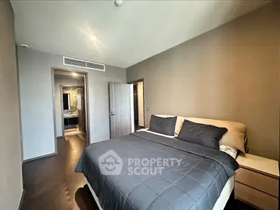 Modern bedroom with sleek design and cozy ambiance