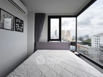 Modern bedroom with panoramic city view and stylish decor