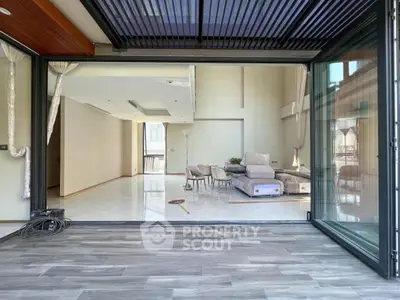 Spacious modern living room with open layout and elegant furniture