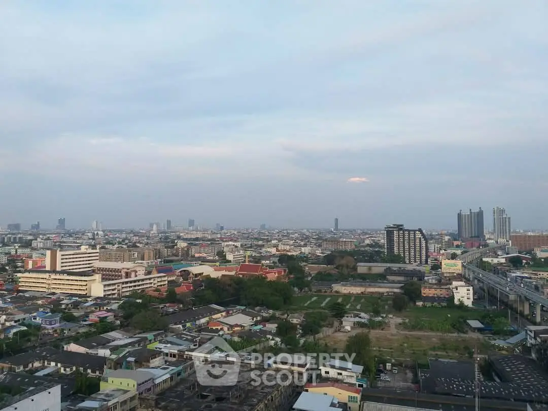 Stunning cityscape view showcasing urban skyline and residential areas from a high vantage point.