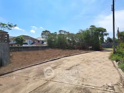 Spacious vacant land plot in a serene residential neighborhood, perfect for building your dream home.