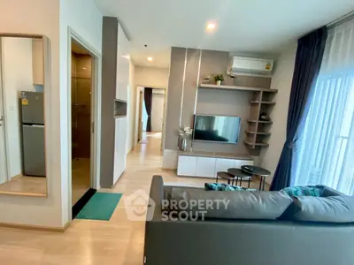 Modern living room with sleek furniture and natural light