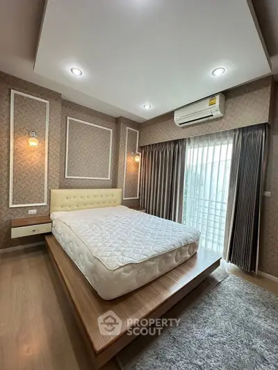 Luxurious bedroom with elegant decor and natural light