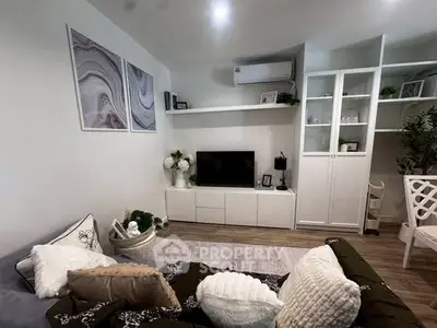 Cozy living room with modern decor and stylish shelving unit