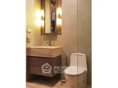 Modern bathroom with sleek fixtures and ambient lighting