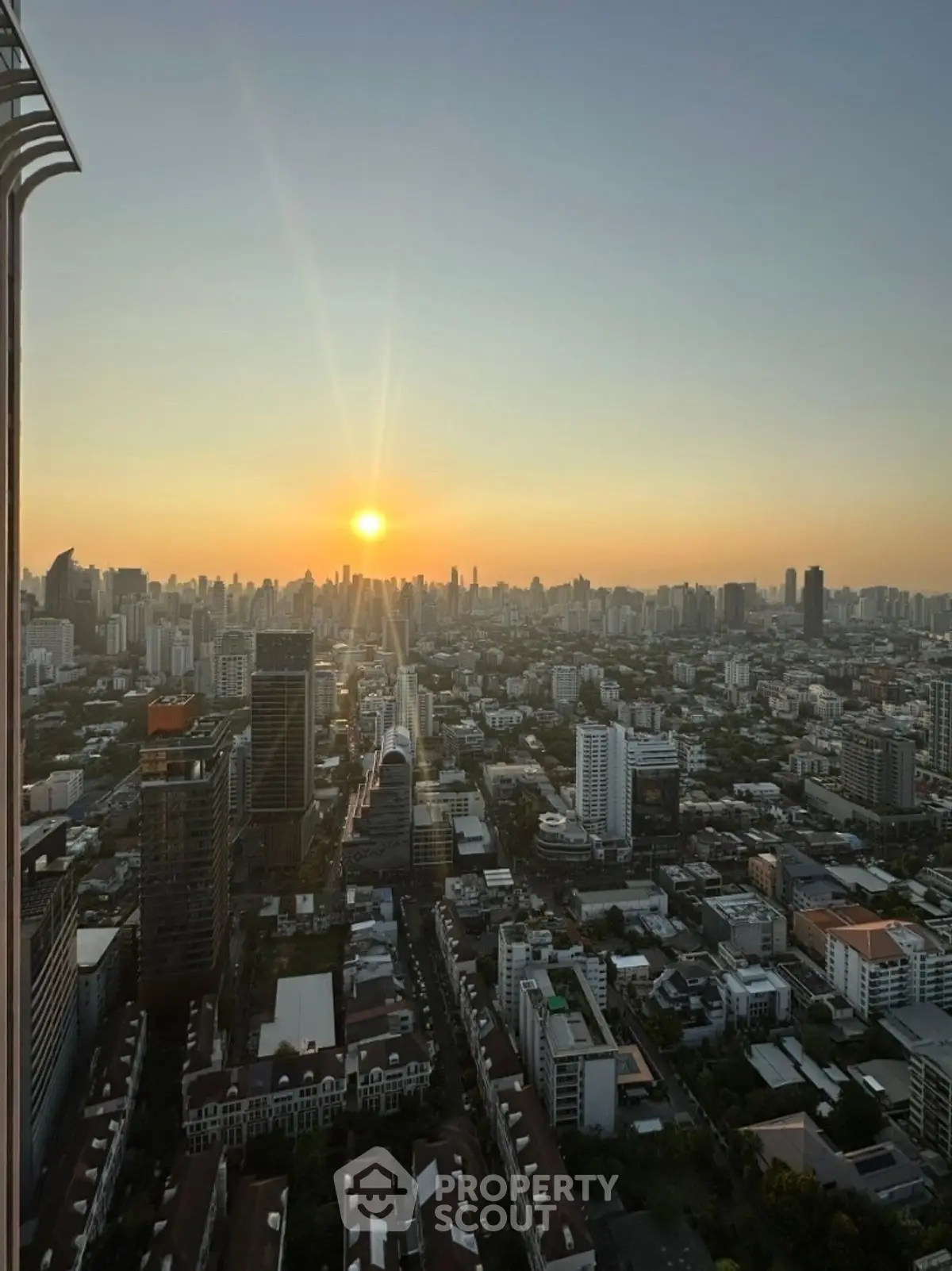 Stunning cityscape view at sunset from high-rise building