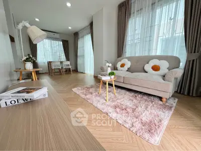 Charming living room with cozy sofa and stylish decor in modern apartment