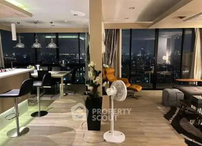 Luxurious modern living room with panoramic city view, stylish furniture, and ambient lighting.