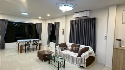 Spacious modern living room with dining area and stylish decor