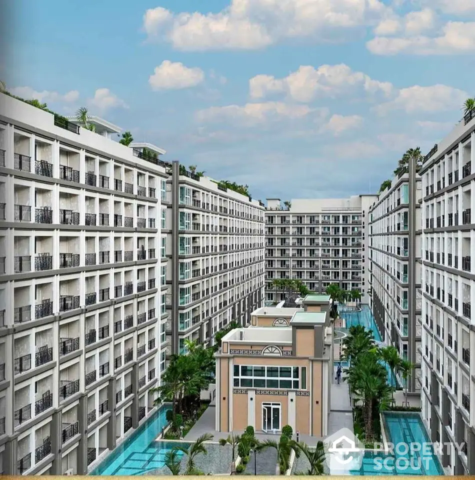 Luxurious modern apartment complex with stunning architecture and inviting swimming pools.