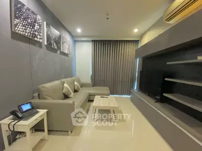 Modern living room with sleek furniture and ambient lighting