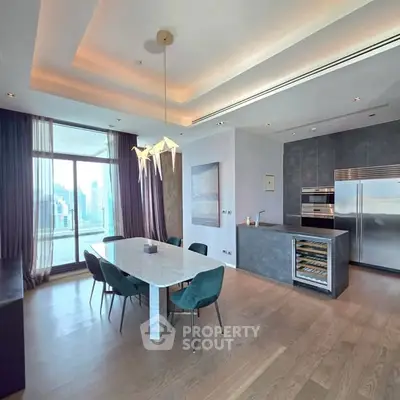 Luxurious dining area with modern kitchen and stunning city view