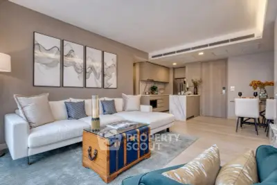 Luxurious living room with elegant decor and modern kitchen in open layout