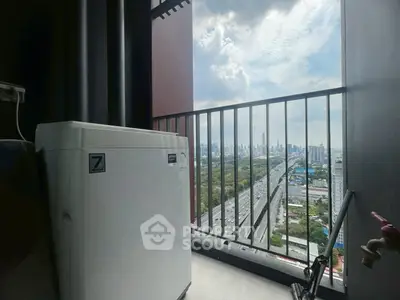 Stunning balcony view with city skyline and washing machine, perfect for urban living.