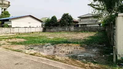 Spacious vacant land plot in a residential area, ideal for building a dream home.