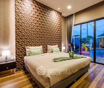 Luxurious bedroom with modern decor and poolside view, featuring elegant lighting and stylish wall design.