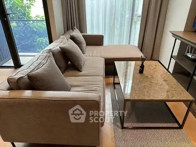 Stylish living room with modern sofa and elegant coffee table, perfect for relaxation and entertaining.