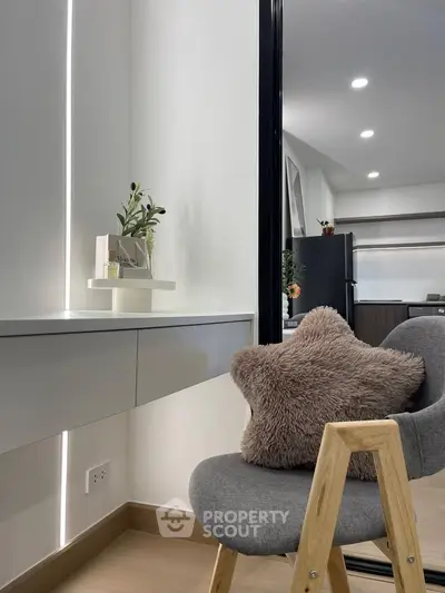 Modern cozy study nook with plush chair and sleek decor