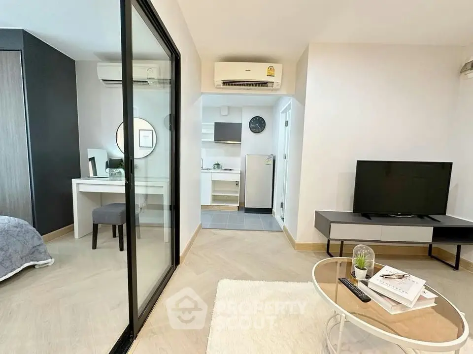 Modern open-plan living room with sleek furniture and stylish decor