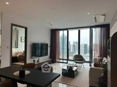 Modern living room with city view, featuring sleek furniture and floor-to-ceiling windows.